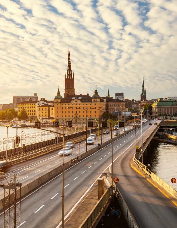 Scenic view of old buildings and car traffic at the bridge Stockholm, Sweden
